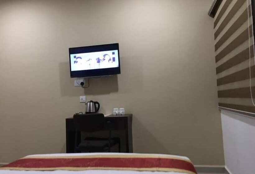 חדר דלוקס, Global Inn