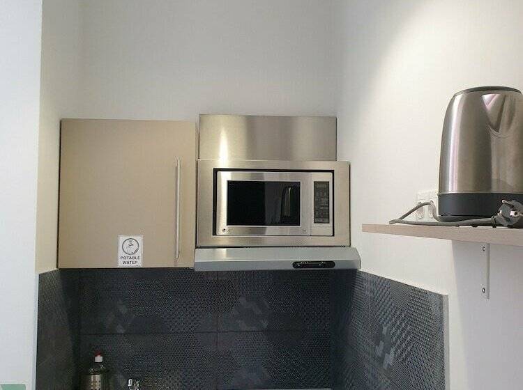 Escritório Estándar, Amber Terrace Studio