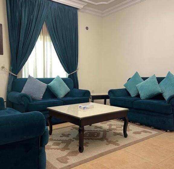 غرفة قياسية رباعية, فندق الحنوة