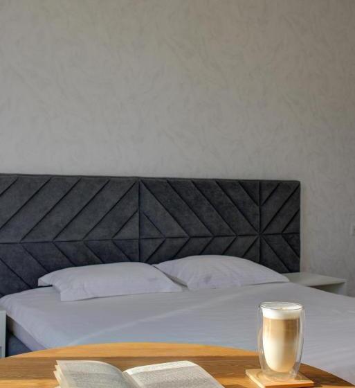 اتاق استاندارد چهار تخته, Novel Hotel And Apartments