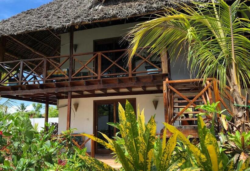 庭の見えるスタンダードトリプルルーム, Maisha Nungwi   Boutique