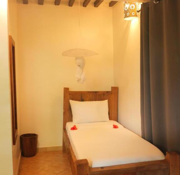 庭の見えるスタンダードトリプルルーム, Maisha Nungwi   Boutique