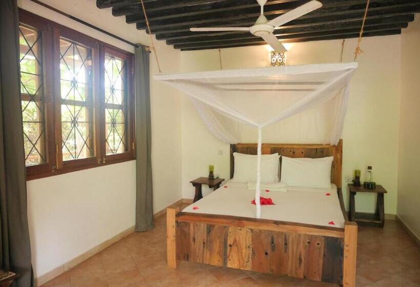 庭の見えるスタンダードトリプルルーム, Maisha Nungwi   Boutique