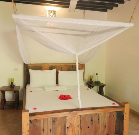 غرفة قياسية ثلاثية مطلة علي الحديقة, Maisha Nungwi   Boutique