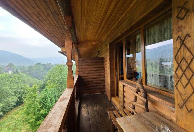 Suite Familiar, гуцульська хата