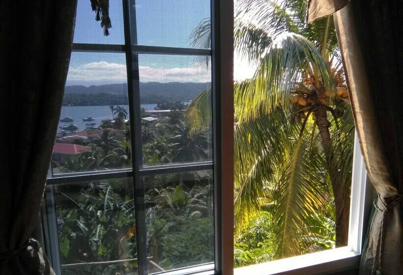 اتاق لوکس, Y Restaurante Casa Escondida