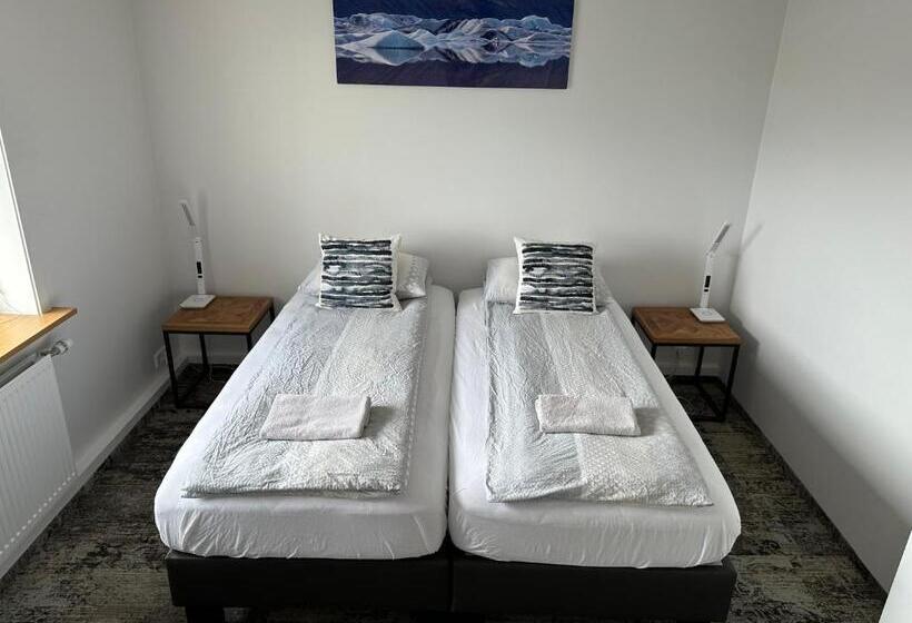 اتاق استاندارد سه تخته با سرویس بهداشتی مشترک, Guesthouse Dyngja