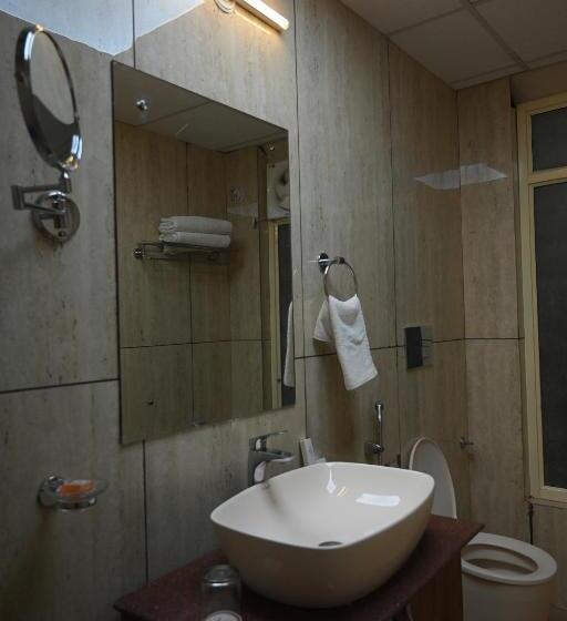 חדר דחוקס עם מיטת קינג, Orchha Club And Resort   Ocr