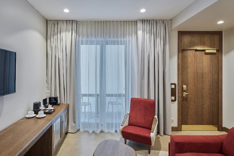 디럭스 룸, De Ladda