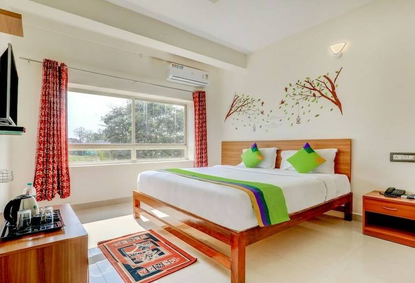Deluxe-huone, Treebo Atithi Comforts, 1 Km From Nisargadhama Forest