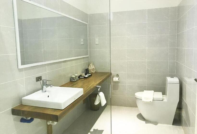 اتاق استاندارد سه تخته با چشمانداز باغ, Peppercorn Beach Resort