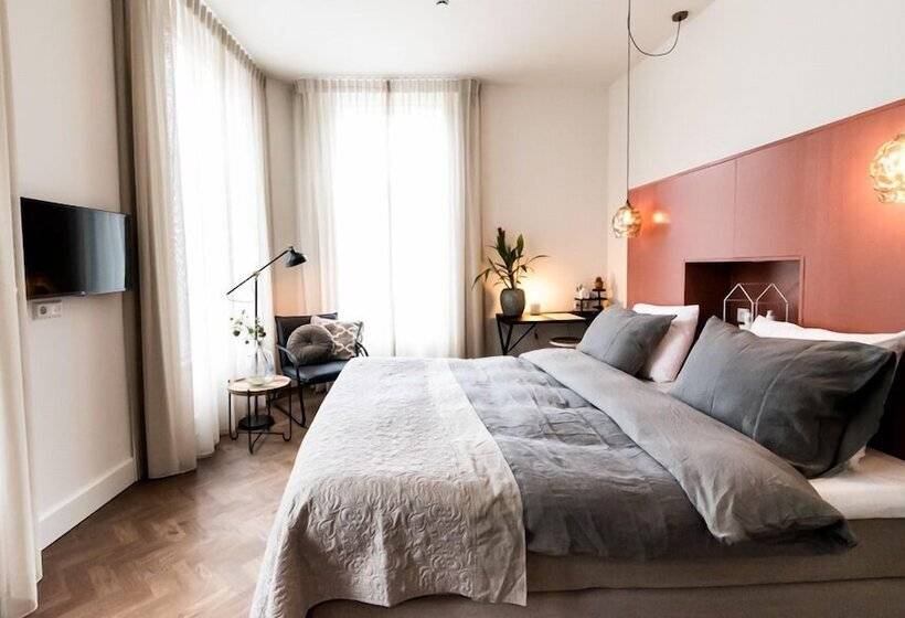 デラックスルーム, De Bankier