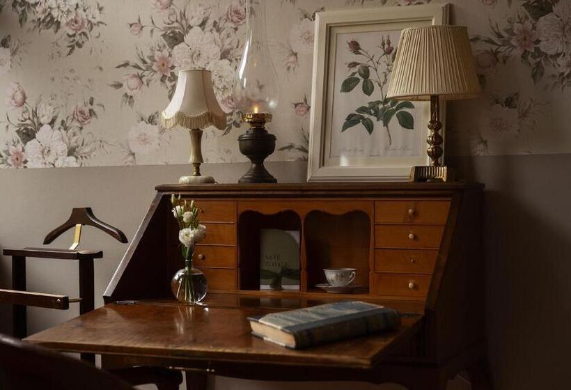 デラックストリプルルーム, Gibsons Hotell