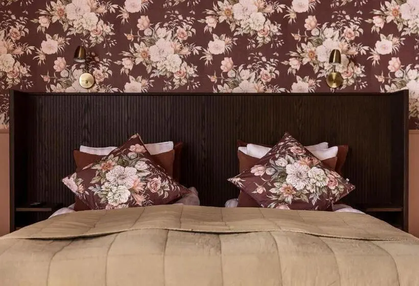 デラックストリプルルーム, Gibsons Hotell