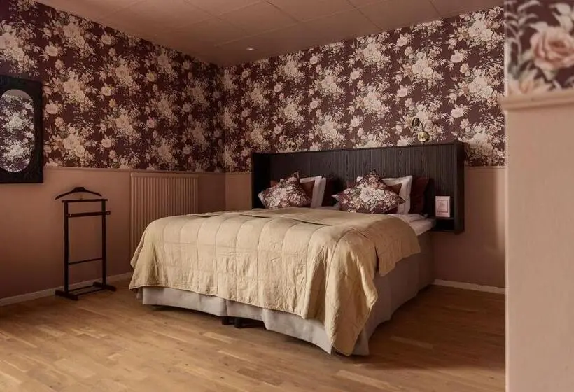 デラックストリプルルーム, Gibsons Hotell