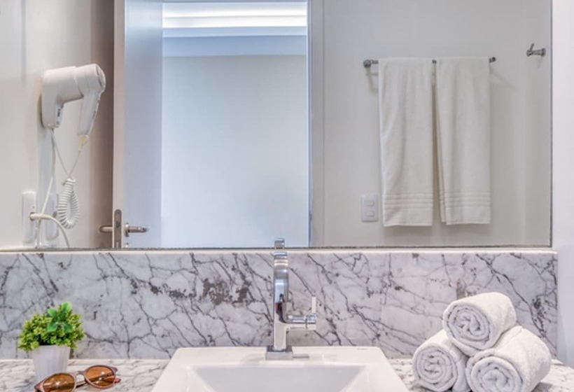 غرفة بريميوم إطلالة جانبية على البحر, Brisa Suítes Pajuçara