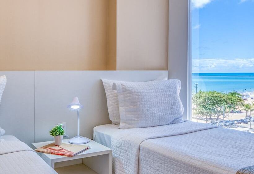 غرفة بريميوم إطلالة جانبية على البحر, Brisa Suítes Pajuçara