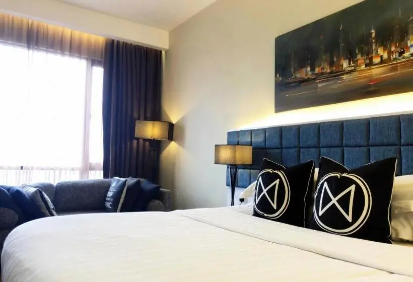 キングサイズベッドのデラックスルーム, M Roof Hotel & Residences