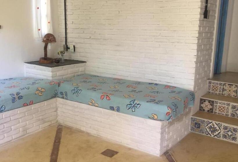 חדר לארבעה סטנדרטי עם מרפסת, Refúgio Do Corsário Imbassai Ba