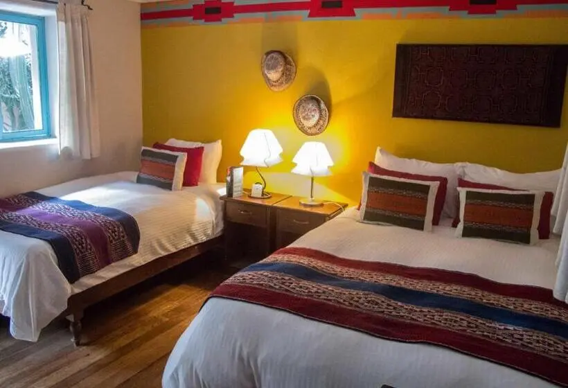 Perhehuone, Pisac Inn