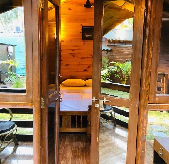 غرفة ديلوكس مزودة بشرفة, Palolem Luxuries Beach Cottages