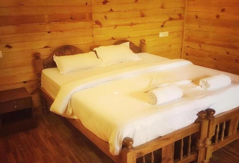 غرفة ديلوكس مطلّة علي البحر مزوَّدة بشُرفة, Palolem Luxuries Beach Cottages