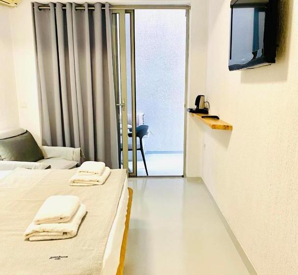 Quarto Triplo Deluxe, Geo & Art Boutique