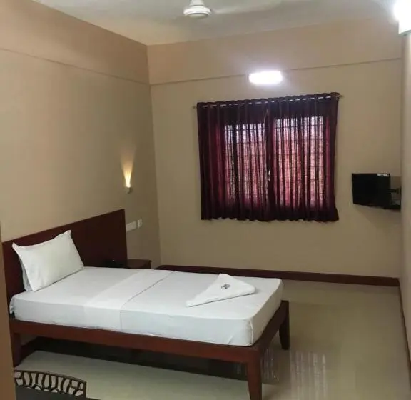 エコノミーシングルルーム, Kalluvalappil Holiday Inn