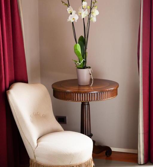 غرفة قياسية مزوَّدة بشُرفة, Vincafè