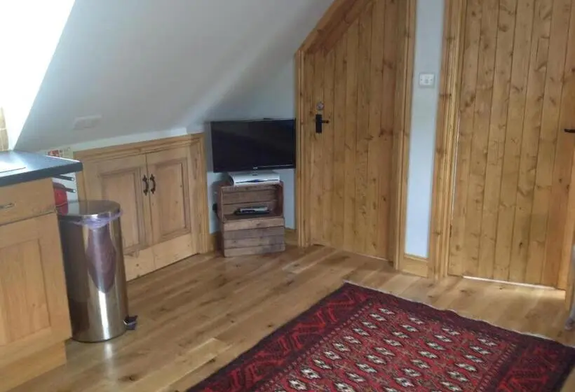 Huoneisto 1 Makuuhuone Puutarhanäkymä, Woodland Guesthouse