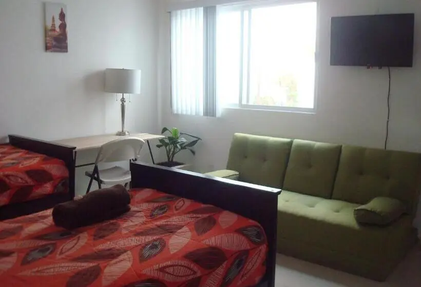 اتاق استاندارد سه تخته با سرویس بهداشتی مشترک, Casa Mariel