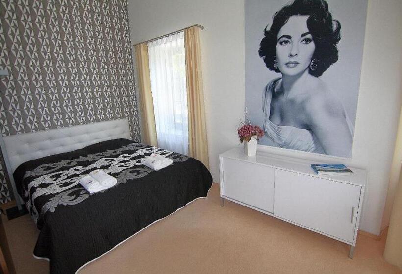 Quarto Estandar, Vila Elis