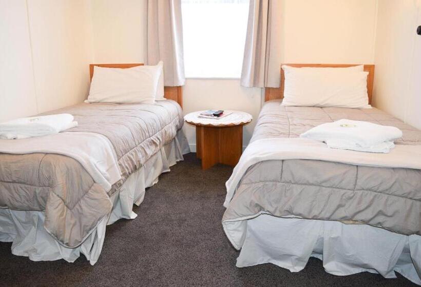 اتاق اکونومی, The Greytown