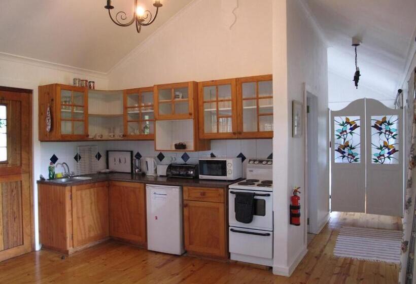 בקתת חדר, Mill Cottages