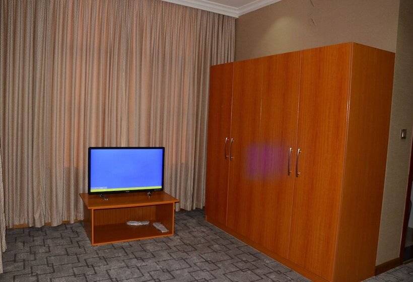 سوییت اجرایی, Kim