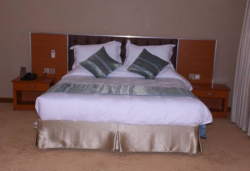 سوییت اجرایی, Kim