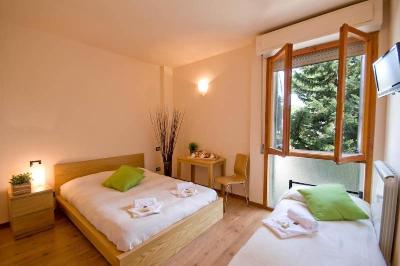 غرفة قياسية ثلاثية, Dormire A Cisanello