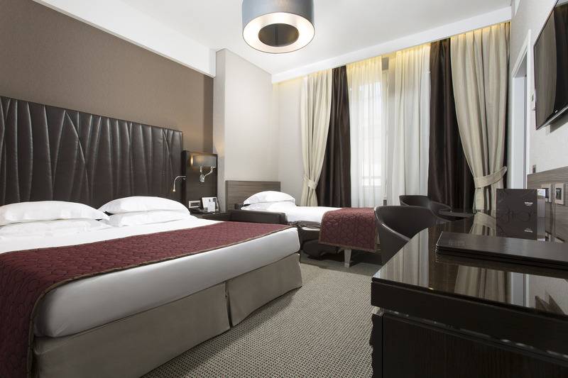 Camera Tripla Deluxe, Artemide