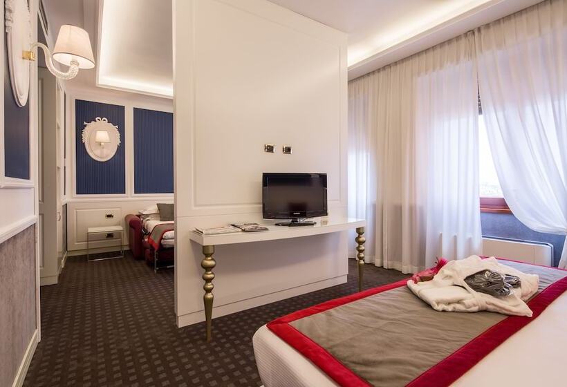 חדר משפחתי, Grande Albergo Roma