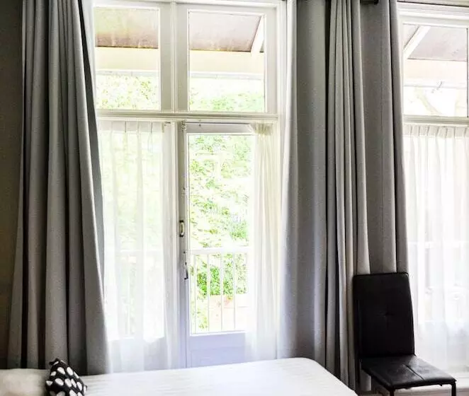 اتاق استاندارد سه تخته با سرویس بهداشتی مشترک, Family Hotel Kooyk
