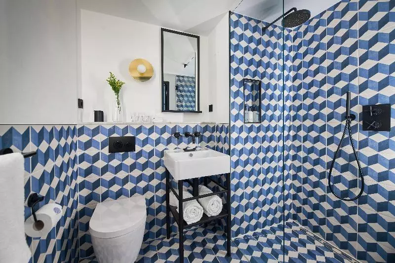 キングサイズベッドのデラックスルーム, Kimpton De Witt Amsterdam, An Ihg