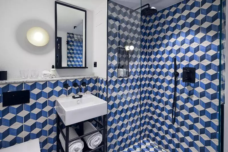 キングサイズベッドのデラックスルーム, Kimpton De Witt Amsterdam, An Ihg