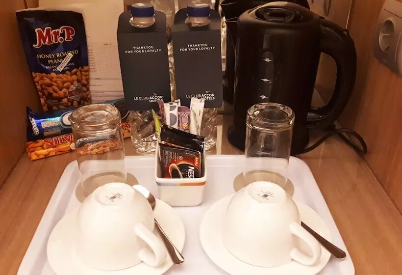 ガーデンビュースーペリアールーム, Grand Tropic Suites Hotel Surabaya