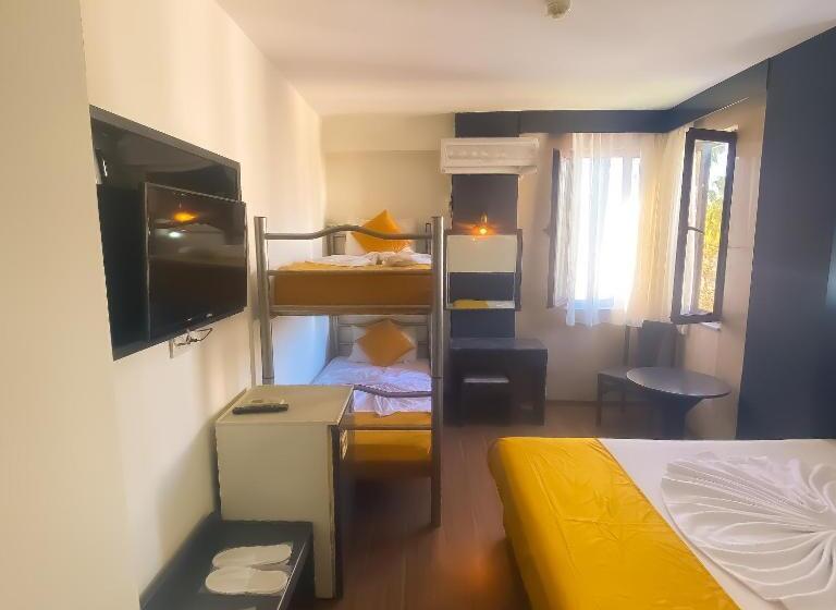 Quarto Quádruplo Standard, Güleryüz 2