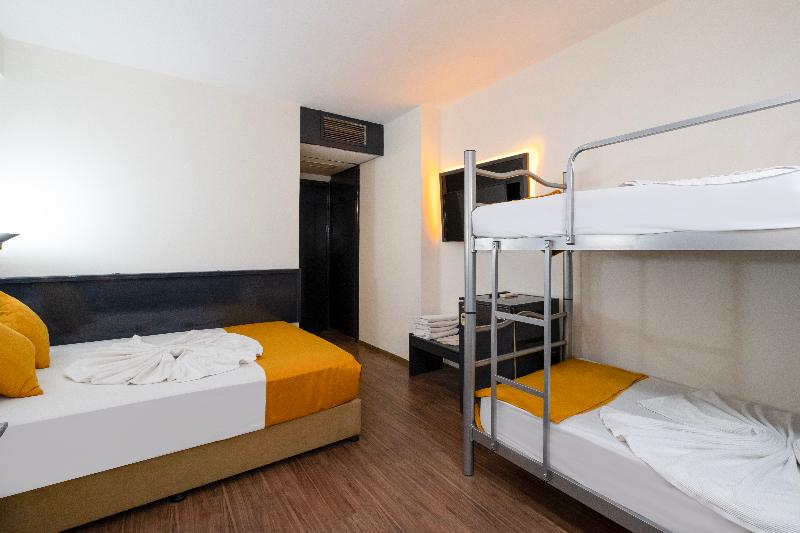 Quarto Quádruplo Standard, Güleryüz 2