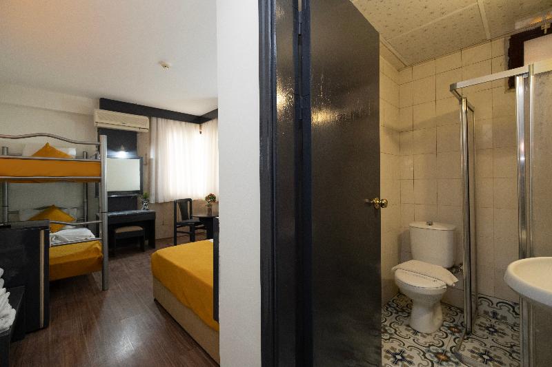 Quarto Quádruplo Standard, Güleryüz 2