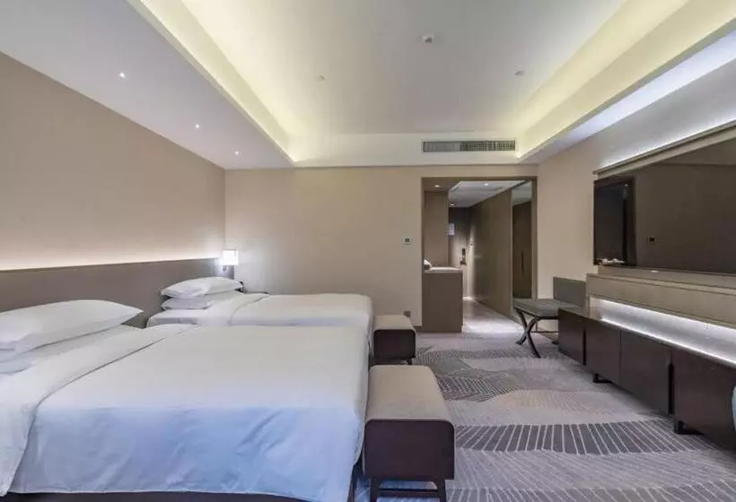 Quarto deluxe, Hyatt Regency Metropolitan Chongqing