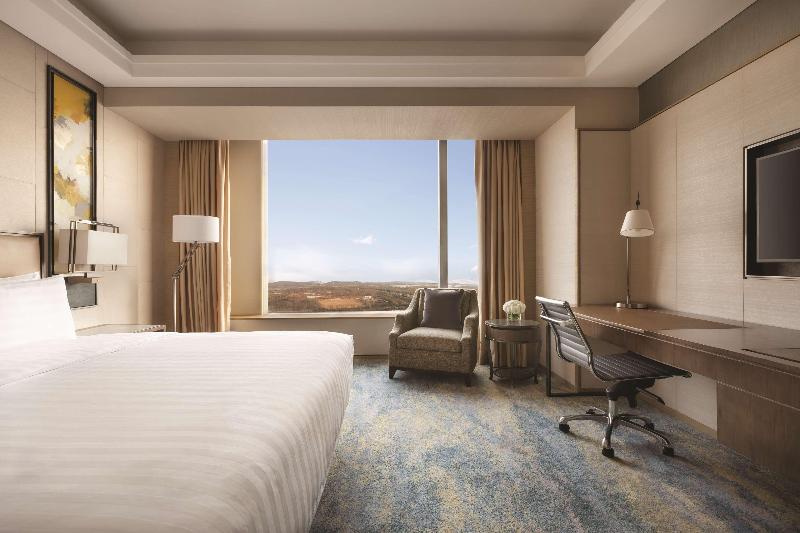 キングサイズベッドのデラックスルーム, Shangrila Harbin