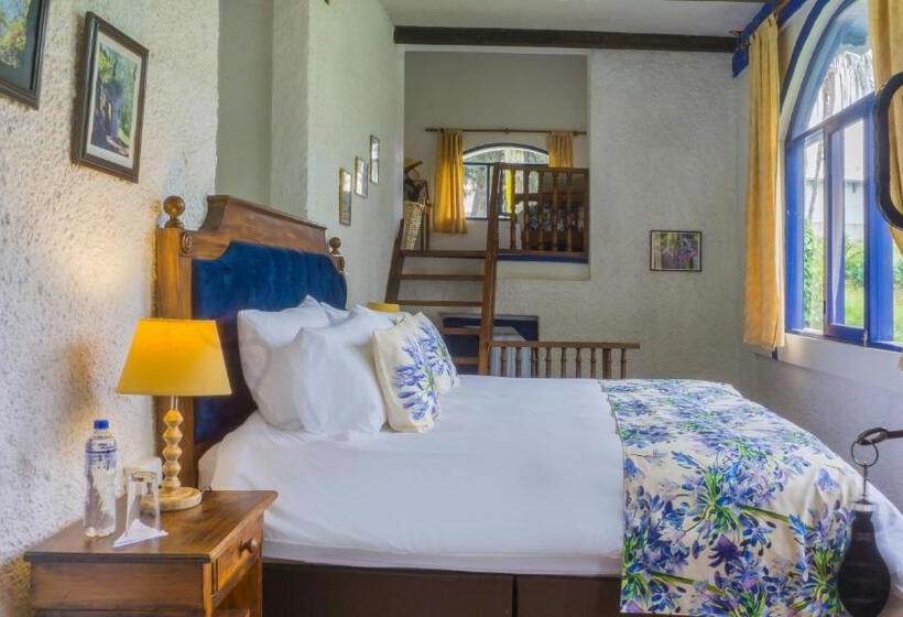 غرفة ديلوكس عائلية, Hostería Hacienda Pinsaqui