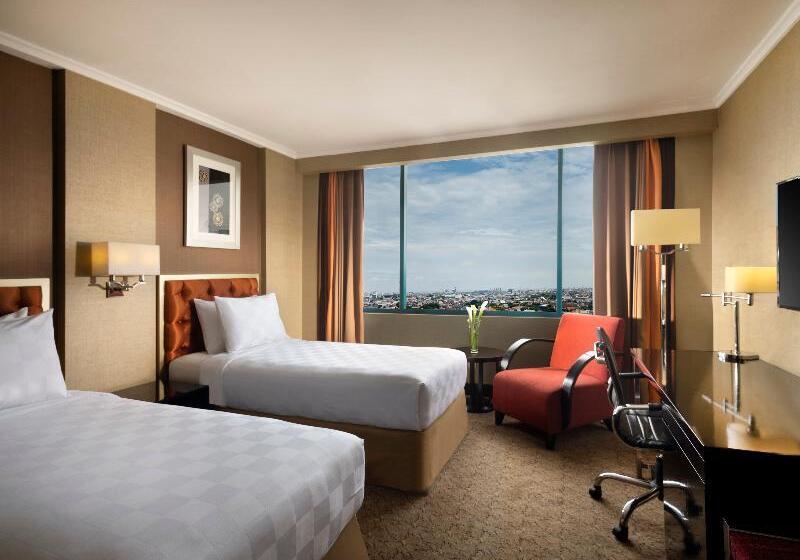 Номер Deluxe, Ciputra Semarang Managed By Swiss Belhotel International